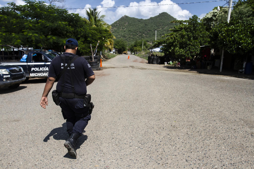 Suman 24 cuerpos encontrados en fosa clandestina de Michoacán. Noticias en tiempo real